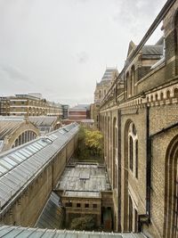 View of old buildings against sky