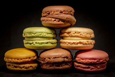 Close-up of cupcakes against black background