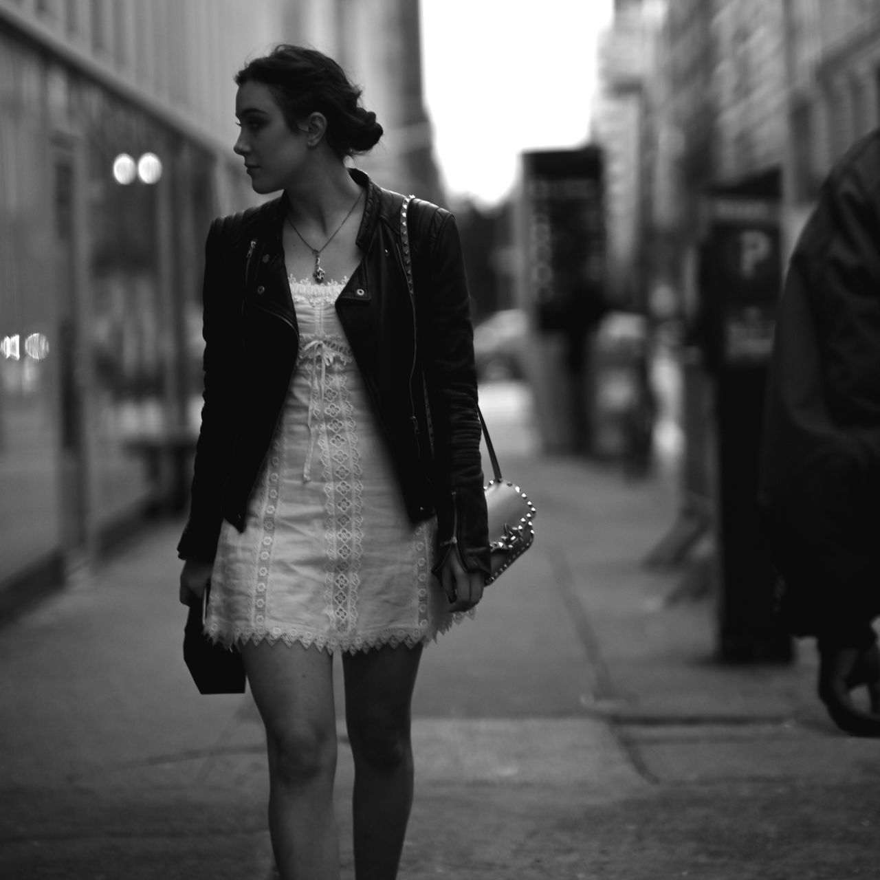 WOMAN STANDING ON STREET