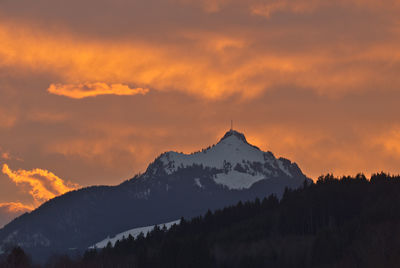 Scenic view of mountains against sky during sunset