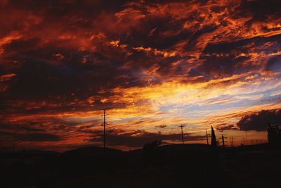 Scenic view of dramatic sky during sunset