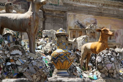 Statue of statues outside building