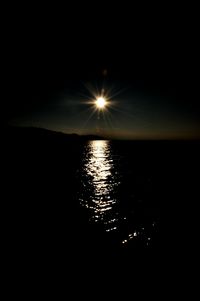 Reflection of sky in water at night