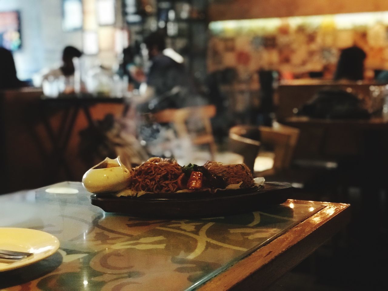 CLOSE-UP OF FOOD SERVED IN RESTAURANT