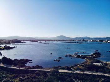 Scenic view of bay against clear sky