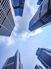 Low angle view of modern buildings against sky