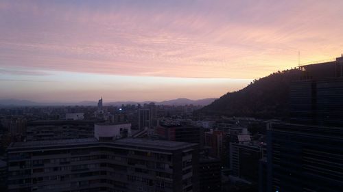 Cityscape against sky during sunset