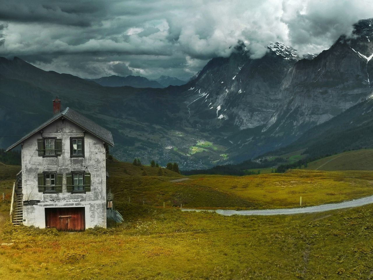 SCENIC VIEW OF MOUNTAINS AGAINST CLOUDY SKY