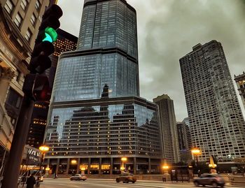 Low angle view of city street against sky