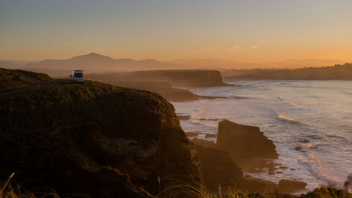 Scenic view of sea against sky during sunset