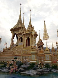 View of temple against cloudy sky