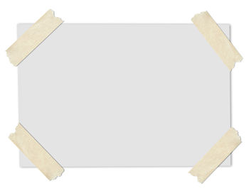 Low angle view of empty paper against white background