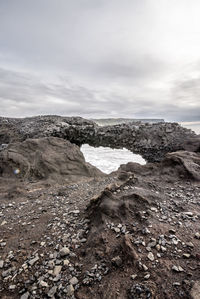 Scenic view of rocks against sky