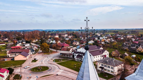 High angle view of buildings in city against sky