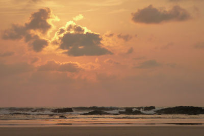 Scenic view of sea against sky during sunset