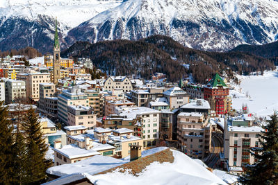 High angle view of buildings in city during winter