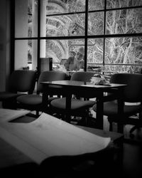 Empty chairs and table in restaurant