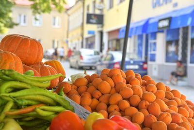 Apricots, hot peppers and other fruit and vegetable for sale at local farmers market. 