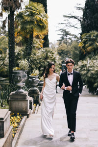 Couple walking on a tree