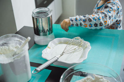 Close-up of ice cream in jar on table