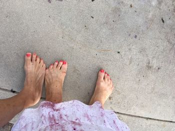 Low section of woman legs on beach