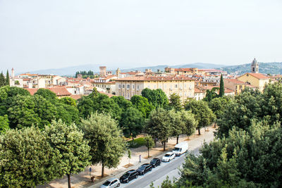 High angle view of buildings in city against clear sky