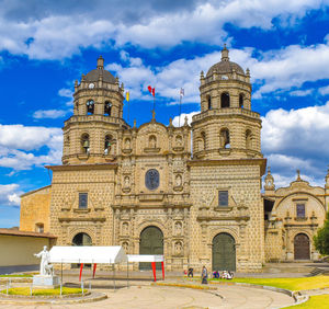 View of historic building against cloudy sky