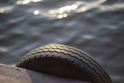 High angle view of tire in water