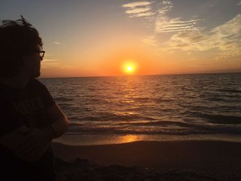 Scenic view of sea at sunset