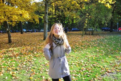 Portrait of young woman in park