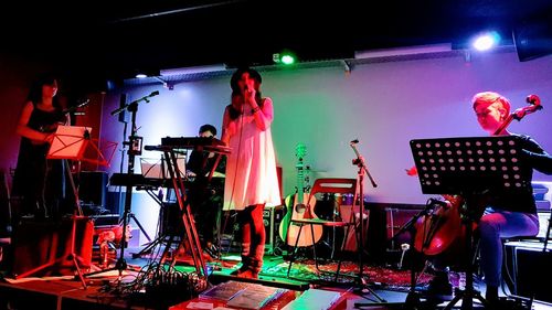 Panoramic view of people at music concert