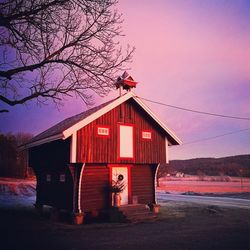 Built structure against sky at sunset