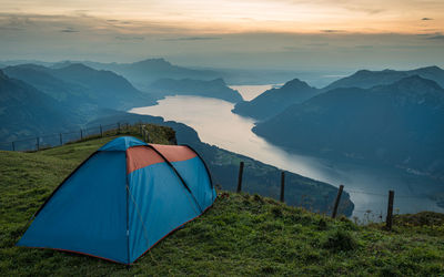 Scenic view of mountains against sky during sunset