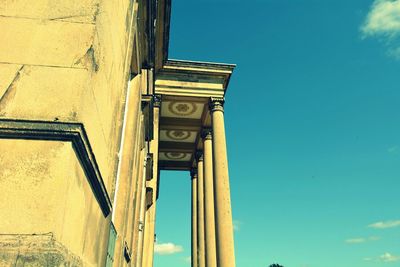 Low angle view of building against blue sky