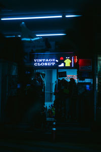 View of illuminated sign at night