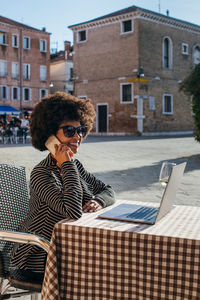 Young business woman making a phone call