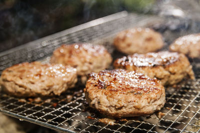 Close-up of meat on barbecue grill