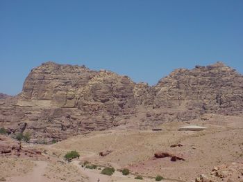 Scenic view of rocky mountains against clear sky
