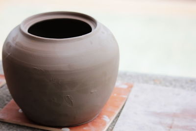 Close-up of coffee cup on table