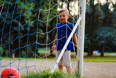 Boy playing in farm