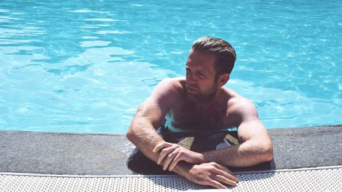 High angle view of man swimming in pool