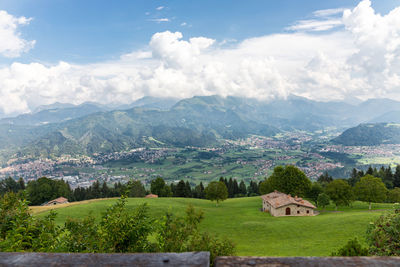 Scenic view of landscape and mountains against sky