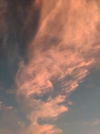 Low angle view of dramatic sky during sunset