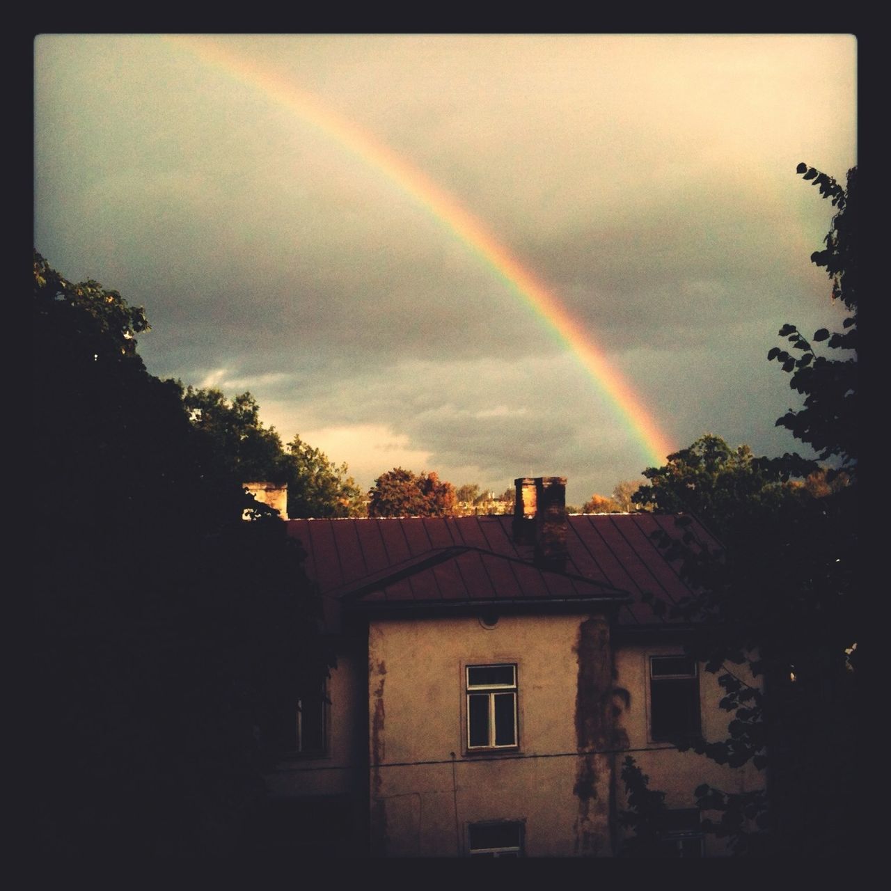 building exterior, rainbow, architecture, built structure, sky, house, tree, cloud - sky, sunset, residential structure, residential building, multi colored, beauty in nature, scenics, nature, outdoors, cloud, cloudy, no people, dusk