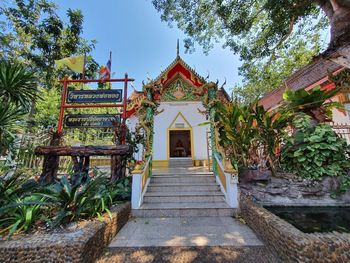 Entrance of temple against building