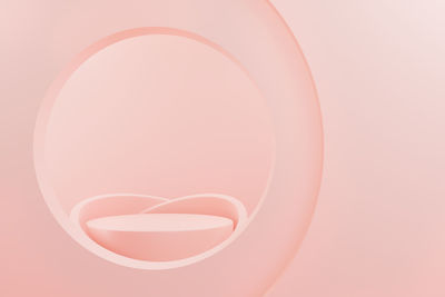Close-up of spiral light over white background