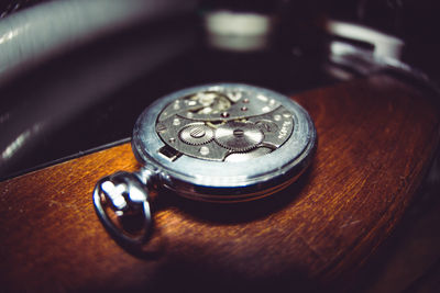 High angle view of clock on table