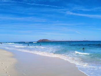 Scenic view of beach against sky