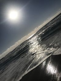 Scenic view of sea against sky during winter