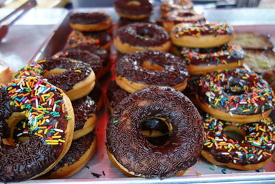 Close-up of donuts for sale in store